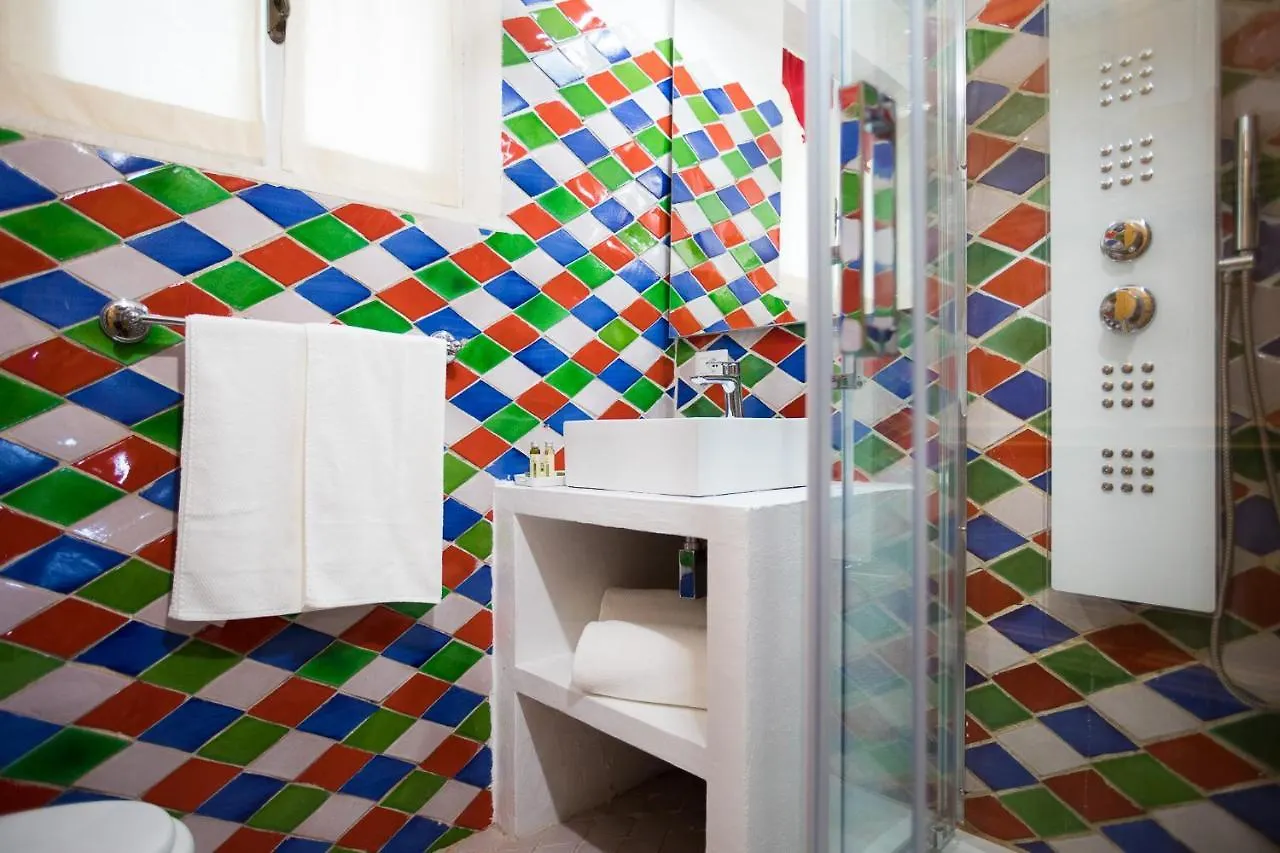 Alojamento de Acomodação e Pequeno-almoço Palmasera Charming Suites Cala Gonone